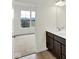 This bathroom has double sinks, white countertops, and is conveniently located near the bedroom at 7205 Rose Hill Ave, Brownsburg, IN 46112