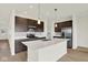 Well-equipped kitchen featuring stainless steel appliances and a large kitchen island at 7205 Rose Hill Ave, Brownsburg, IN 46112