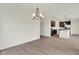 Open-concept floor plan connects the living and kitchen area for easy entertaining at 7205 Rose Hill Ave, Brownsburg, IN 46112