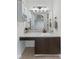 Bathroom featuring vanity, marble countertop, large mirror, and modern light fixture at 7239 N Orchard Dr, Indianapolis, IN 46236