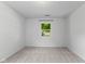 Bedroom with plush carpet and lots of natural light at 7239 N Orchard Dr, Indianapolis, IN 46236