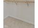 Walk-in closet with built-in shelving and hanging rods, providing ample storage space at 7239 N Orchard Dr, Indianapolis, IN 46236