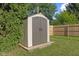 Outdoor shot of storage shed in fenced backyard of property at 7239 N Orchard Dr, Indianapolis, IN 46236