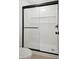 Modern shower with black trim, white subway tile, and a built-in shower niche at 7239 N Orchard Dr, Indianapolis, IN 46236