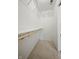 Walk-in closet with tile floor and shelving for efficient organization at 7239 N Orchard Dr, Indianapolis, IN 46236