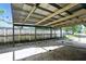 Large carport providing ample space and protection for vehicles, with access to the backyard at 7307 Twin Beech Dr, Indianapolis, IN 46226