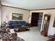 Cozy living room features traditional furniture, large windows, and ample space for relaxation at 7334 Fairwood Cir, Indianapolis, IN 46256