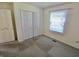 A bright bedroom featuring natural light and built-in closet at 7567 Muirfield Pl, Indianapolis, IN 46237