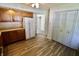 Spacious kitchen showcasing ample wood cabinets, stainless steel appliances, and modern flooring at 7567 Muirfield Pl, Indianapolis, IN 46237