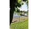 Relaxing lake view with access through a fenced yard, ideal for recreation at 7567 Muirfield Pl, Indianapolis, IN 46237