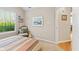 Inviting bedroom featuring a comfortable bed, window view, and decorative touches, creating a relaxing personal space at 7850 King Post Dr, Indianapolis, IN 46237
