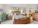 Cozy bedroom featuring wood furnishings, soft lighting, and serene decor for a peaceful retreat within the home at 7850 King Post Dr, Indianapolis, IN 46237