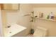 Bathroom featuring a sink, toilet, flooring and shelving at 7966 Chiltern Dr, Indianapolis, IN 46268