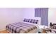 Serene bedroom with a comfortable bed, and soft lighting, creating a peaceful retreat for restful nights and relaxation at 7966 Chiltern Dr, Indianapolis, IN 46268