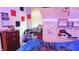 Bedroom featuring a bed with blue covers, a drawer and LED lights at 7966 Chiltern Dr, Indianapolis, IN 46268