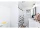Bright bathroom featuring a vanity, modern fixtures, and a shower with a stylish curtain at 806 N Gray St, Indianapolis, IN 46201