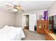 Bedroom featuring wood dresser and plush carpet at 806 N Gray St, Indianapolis, IN 46201