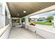 Relaxing front porch offering a glimpse of the neighborhood and a comfortable outdoor space at 806 N Gray St, Indianapolis, IN 46201
