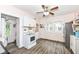 Functional kitchen with updated appliances, neutral cabinets, and plenty of room to cook and dine at 806 N Gray St, Indianapolis, IN 46201