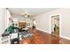 Spacious living room featuring hardwood floors, a brick fireplace, and plenty of room to relax at 806 N Gray St, Indianapolis, IN 46201