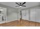 This bedroom features hardwood floors, ample closet space, and a convenient ensuite bathroom at 8105 Allisonville Rd, Indianapolis, IN 46250