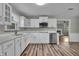 Beautiful kitchen with stainless appliances and bright white cabinets and countertops at 8105 Allisonville Rd, Indianapolis, IN 46250