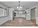 Spacious kitchen features white cabinets, stainless appliances, and eat-in area at 8105 Allisonville Rd, Indianapolis, IN 46250