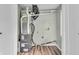 Utility room with flooring and shelving ready for the new home owner at 8105 Allisonville Rd, Indianapolis, IN 46250