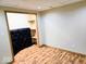 Basement storage area with built-in shelving offers organization options at 8394 Glen Highlands Dr, Indianapolis, IN 46236