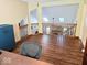 Open living room featuring hardwood floors, wooden banisters, and great views into the loft at 8394 Glen Highlands Dr, Indianapolis, IN 46236