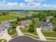 Aerial view of a home in a residential area, featuring a manicured lawn and landscaping at 8754 Lily Ct, Zionsville, IN 46077