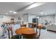 Finished basement with a foosball table, pool table, exercise equipment and a sitting area with chairs at 8754 Lily Ct, Zionsville, IN 46077