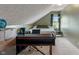 Bedroom with a pitched roof, carpet, desk and bed, perfect for relaxing and working at 8754 Lily Ct, Zionsville, IN 46077