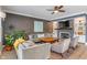 Bright living room with comfortable seating, a TV, and a fireplace at 8754 Lily Ct, Zionsville, IN 46077