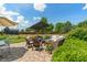 A backyard patio with an outdoor seating area provides a perfect relaxation space at 8754 Lily Ct, Zionsville, IN 46077