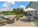 Spacious backyard brick patio with ample seating, perfect for relaxing and entertaining outdoors at 8754 Lily Ct, Zionsville, IN 46077