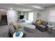 Spacious finished basement with a fireplace, comfortable seating, and ample lighting at 9323 Doubloon Rd, Indianapolis, IN 46268