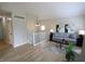 Bright living room features modern furnishings and light wood flooring at 9323 Doubloon Rd, Indianapolis, IN 46268
