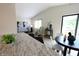 Open-concept living space features bright living room and adjacent dining area and kitchen at 9323 Doubloon Rd, Indianapolis, IN 46268