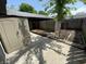 Backyard with fenced-in gardening space, storage shed and concrete patio at 9458 Fordham St, Indianapolis, IN 46268