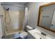 Bathroom featuring a bathtub and shower combination, toilet, and modern vanity at 9458 Fordham St, Indianapolis, IN 46268