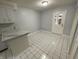 Cozy dining area with lots of natural light, and white tile floors at 9458 Fordham St, Indianapolis, IN 46268