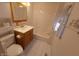 Cozy bathroom with tiled floors, toilet and a shower tub combination at 980 W Poplar St, Zionsville, IN 46077