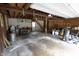 Spacious garage interior with ample storage, exposed beams and an open layout at 980 W Poplar St, Zionsville, IN 46077