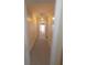 Well-lit hallway featuring carpet, leading to other rooms in the home at 980 W Poplar St, Zionsville, IN 46077