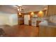 Well-lit kitchen featuring wooden cabinetry, ample counter space, and modern appliances at 980 W Poplar St, Zionsville, IN 46077