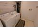 Functional laundry room featuring a washer, dryer, and utility connections at 980 W Poplar St, Zionsville, IN 46077