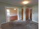 Open living room showcasing wood floors, neutral walls, and natural light at 980 W Poplar St, Zionsville, IN 46077