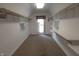 Spacious walk-in closet with shelving, natural light, and ample storage space at 980 W Poplar St, Zionsville, IN 46077