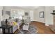 Inviting living room featuring modern furnishings, a neutral color palette, and wood flooring at 9936 Waterside Dr, Noblesville, IN 46060